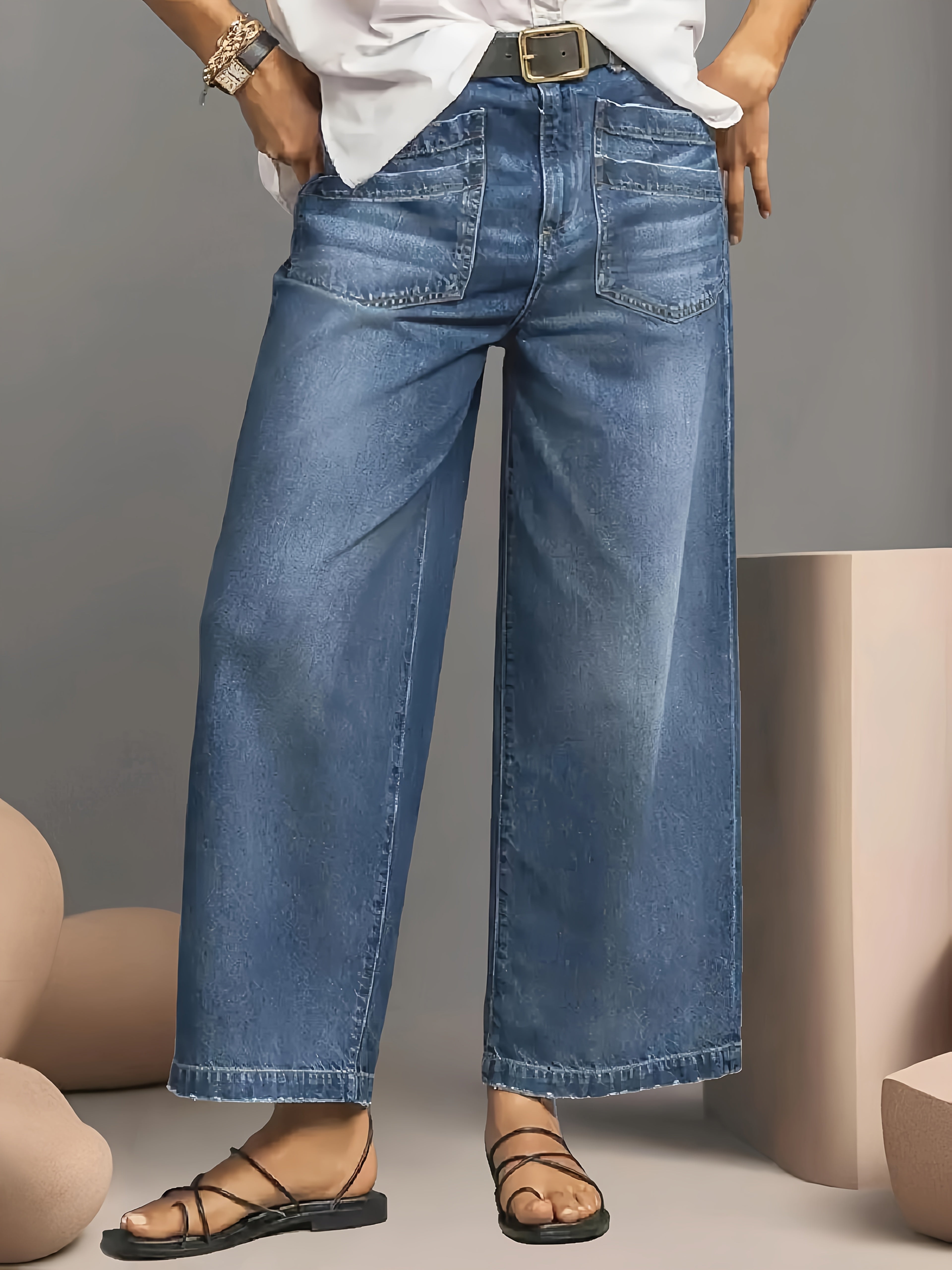 Jean large bleu clair à ourlet effiloché – LuvaParis LuvaParis