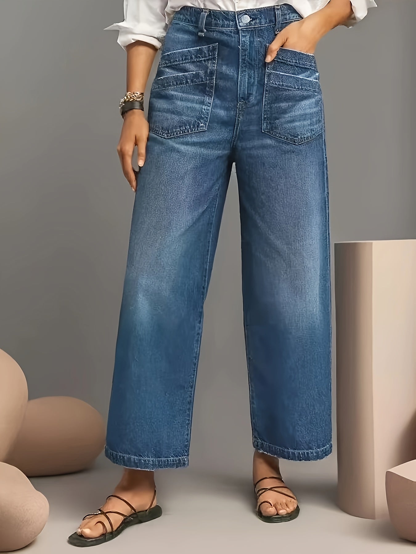 Jean large bleu clair à ourlet effiloché – LuvaParis LuvaParis